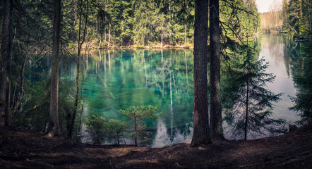 Natural spring in southern Finland. Water is so clear that it´s turquoise color. Water can be drink directly from the spring.