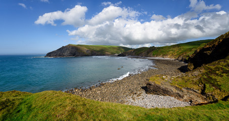 Panoramic view of the beach and cliffs at Crackington Haven near Bude on the north coast of Cornwall, from the foot of the Cambeak Headland