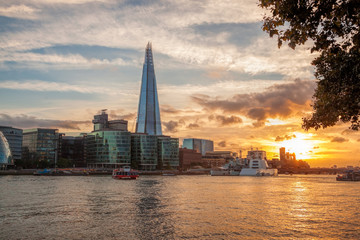 Fototapeta na wymiar skyline with modern architecture against colorful sunset in London, England, UK