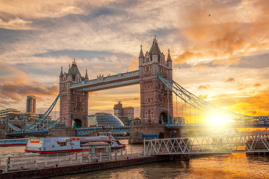 Tower Bridge against colorful sunset in London, England, UK