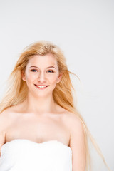 Fototapeta premium Portrait of young pretty girl over white background.