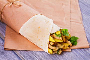 Chicken wraps with mango, basil and mint. Burrito with chicken