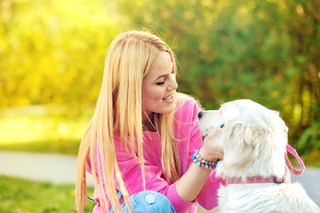 Woman enjoying park with dog