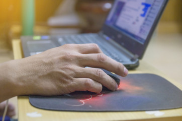 hand working at home office hand on keyboard close up