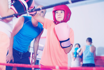 Fototapeta na wymiar Children training on boxing ring