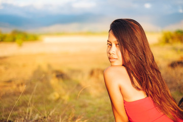 Fototapeta premium portrait of a beautiful sexy girl in summer field,Hot summer girl