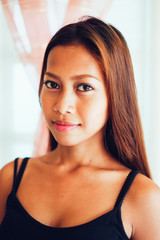 Naklejka premium Natural portrait,Beautiful Asian girl smiling. Native Asian beauty. Asian woman