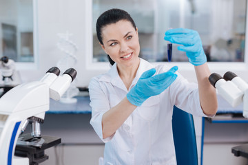 Attractive lab assistant turning her head aside