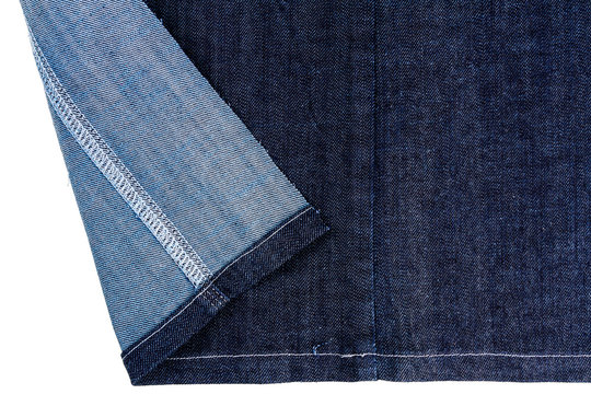 Piece of dark blue jeans fabric