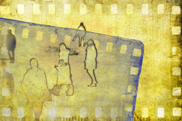 Vintage sepia film strip frame on old and damaged paper background with human figures.
