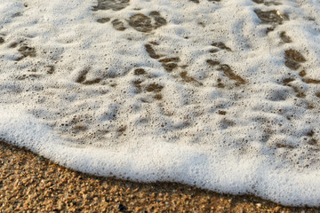 Soft Wave Of Blue Ocean On Sandy Beach