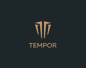 Abstract line shield universal solid logo design. Luxury business icon. Game protection helmet security vector logotype. Letter T symbol