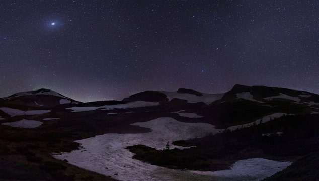 stars over snowy hills