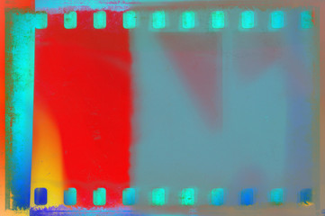 Vintage film strip frame on old and damaged paper background. Blue and red tones.