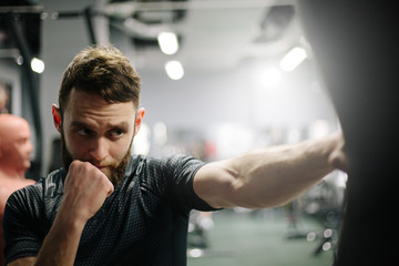 Man doing workout or training in the gym