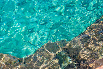 Blue sea, rocks underwater