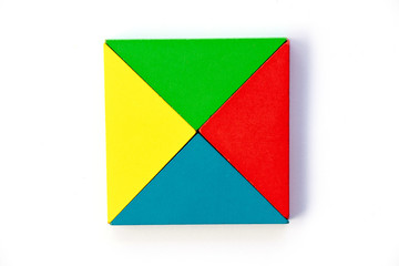 Wooden colorful toy block in triangle shape build to square design on white background