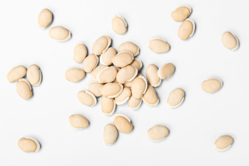 dried raw hyacinth beans on white, top view