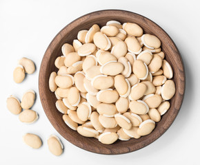 dried raw hyacinth beans on white, top view