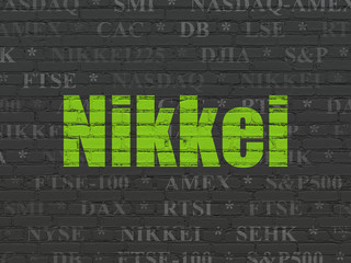 Stock market indexes concept: Nikkei on wall background