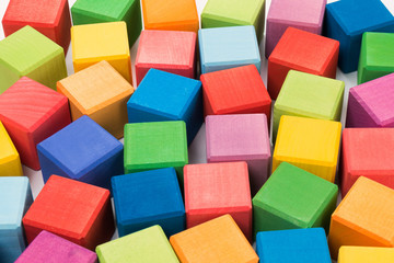 Fototapeta na wymiar Colorful wooden toy cubes background