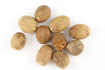 nutmeg seeds isolated on a white background