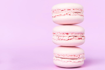 Three sweet purple macaroons