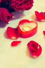 red rose with ring