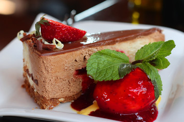 Chocolate cake with fresh strawberries and ice cream