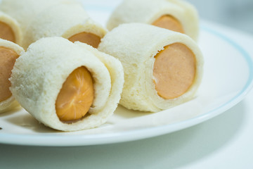 bread with sausage roll.selective focus