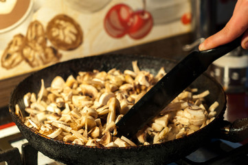 roasted mushrooms with onion in a pan