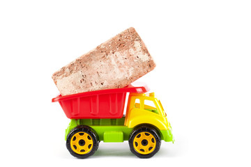 Toy truck with brick