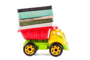 Toy truck with stack of books