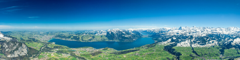 Naklejka na ściany i meble Panorama-Aussicht vom Niesen mit Thun, Interlaken, Spiez, Thunersee und Eiger, Mönch und Jungfrau im Frühling