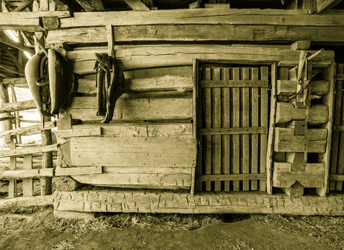 Barn Interior. Wooden 18th century era barn interior with stall and tack. This is a historical barn in a national park and not a privately owned property.