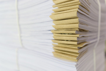 Pile of unfinished documents on office desk, Stack of business paper