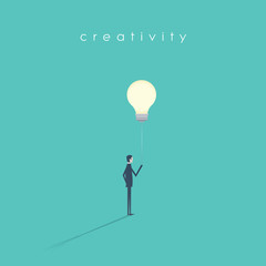 Business creativity vector symbol with businessman holding lightbulb on a string like a balloon. © jozefmicic