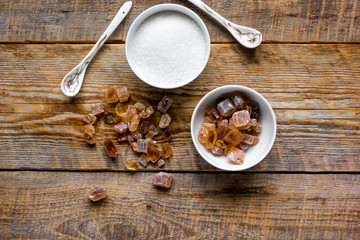 white and brown sugar for cooking sweets on kitchen wooden table top view mock-up