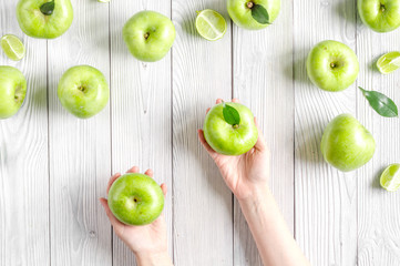 summer food with green apples on white background top view