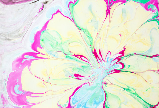 acrylic color marbling art pattern on paper background..