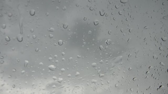 Raindrop on glass front of my car at Nakhon Nayok, Thailand