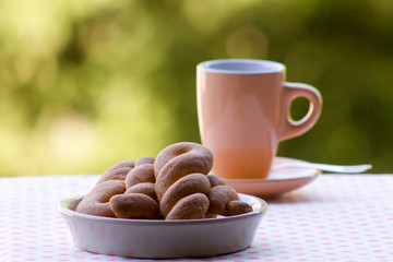 italian breakfast, coffee  with biscuits of pastry
