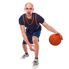 Naklejka premium Full length portrait of a basketball player with ball
