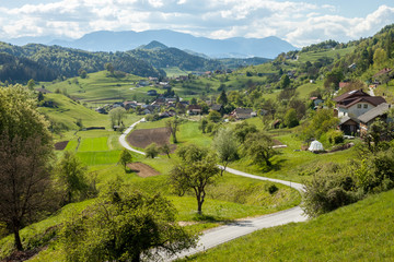 mountain cute village between green hills