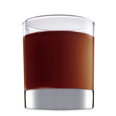 Original Irish Cream Liqueuron alcohol cocktail or chocolate mocktail in classic glass with brown beverage isolated on white background