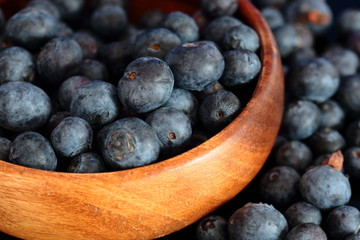 Blueberries in a wooden bowl