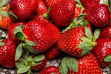 background from fresh ripe useful fruit strawberry closeup