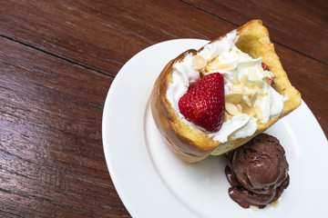 Honey toast strawberry on white plate