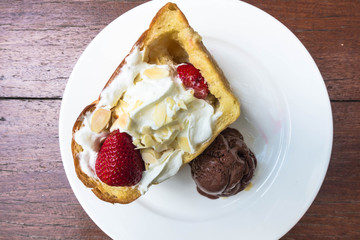 Honey toast strawberry on white plate
