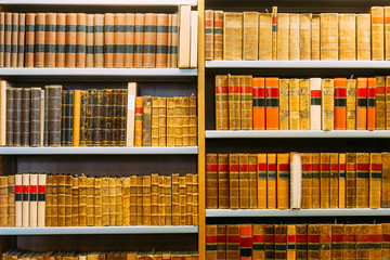 Aged Ancient Antique Old Vintage Books On A Shelfs In Library